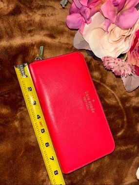 kate spade bright pink zip-around wallet